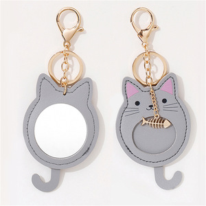 PU <b>leather</b> <b>keychain</b> mirror pendant, portable cartoon mirror, one-way mirror, makeup mirror, gift mirror, giveaway. - Product Image 1