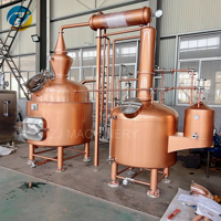 Équipement de distillation d'huile essentielle de cuivre rouge de grande taille 1000L avec réservoir de stockage pour la distillation d'huile essentielle