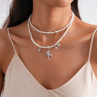 Colliers ras du cou vintage, chaînes de clavicule, colliers à double rang avec perles et strass en forme d'étoile, bijoux de cou minimalistes de niche haut de gamme