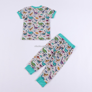 <span class=keywords><strong>Pigiama</strong></span> per Neonati in Viscosa Sostenibile con Stampa Dinosauro, Manica Corta, Traspirante, Certificato CPC e CPSIA, Produzione OEM Personalizzata all'Ingrosso - Product Image 2
