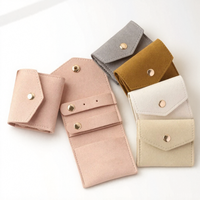 Mini étui de voyage pour bijoux, organiseur de bijoux enroulable de voyage avec bouton-pression pour bagues, boucles d'oreilles, clous d'oreilles, colliers, sac cadeau