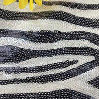 Nouvelle mode vêtements pour femmes scène Costume robe 3mm paillettes broderie noir et blanc rayures tigre zèbre motif paillettes tissu