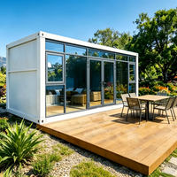 Maison conteneur en verre préfabriquée moderne, modulaire, en acier, isolée, à faible consommation d'énergie, à un seul niveau et abordable