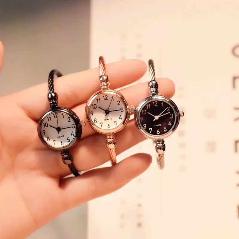 Kadın moda yaratıcı bilezik İzle Vintage zarif tasarımcı bayanlar bilek saatler basit sayı kadın saat damla nakliye