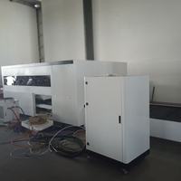 Machine de découpe laser à fibre Hoysook 3000w 6000w entièrement fermée avec table d'échange pour la découpe de tôles