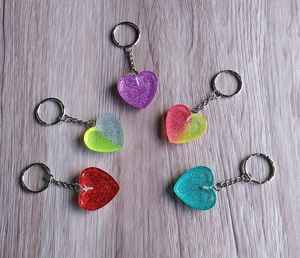 Porte-clés en résine transparente avec éléments décoratifs intégrés, finition lisse et brillante, accessoire durable pour une organisation élégante et quotidienne - Product Image 2