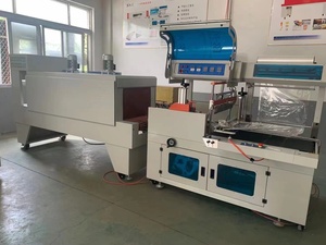 Fully Automatic Electric High-Accuracy Film Shrink Wrapping Machine for Food Beverage Bottles Textiles Cans Cases PLC Controlled - Product Image 3