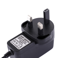UK-Stecker AC zu DC Netzteil 3V-24V 2A Typ-C/Micro-USB PC-Material