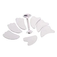 Outils faciaux Gua Sha en acier inoxydable d'usine Logo personnalisé Massage par grattage Guasha en métal pour le corps relaxant Guasha et rouleau