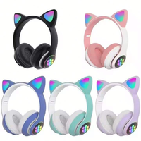 Precio al por mayor, bonitos auriculares inalámbricos con garra de gato, orejas de gato luminosos con auriculares inalámbricos, auriculares estéreo sencillos y bonitos