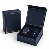 Boîte cadeau de luxe en forme de livre bleu marine, en similicuir rigide avec bordure dorée, insert en mousse EVA pour ensemble montre et bracelet