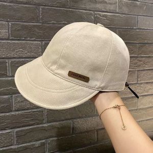 Gorra de béisbol de lona para mujer, ajustable, transpirable, con protección solar, para primavera y otoño, en colores blanco, negro, caqui, azul y café. - Product Image 1