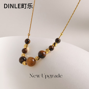 Collar de piedra de ojo de tigre Dinle, cadena de suéter en capas con forma de bola de aleación de zinc para mujer, accesorio de moda para otoño e invierno - Product Image 1