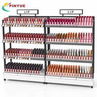 Étagère de présentation de cosmétiques en métal sur pied pour la vente au détail, 5 niveaux, unité d'étagérage commerciale pour maquillage avec plateaux en acrylique pour les magasins de beauté