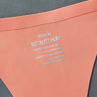 Sous-vêtements érotiques sexy de style européen et américain pour femmes, fines bretelles, boucle à anneau métallique, string taille basse, respirant, en nylon et coton, couleur chair