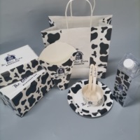 Boîte d'emballage alimentaire jetable haut de gamme avec gaufrage, pelliculage brillant/mat, et pochettes personnalisées pour gâteaux, chips et plus