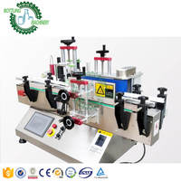 Machine à étiqueter auto-adhésive avec codage de ruban, automatique, pour le parfum, le détergent, la lessive, les bouteilles rondes, les tubes, les bocaux