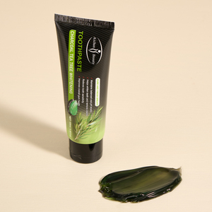 Prix de gros 100g Dentifrice blanchissant au <span class=keywords><strong>charbon</strong></span> et à l'arbre à thé Équilibre le pH buccal Haleine fraîche longue durée en vrac - Product Image 5