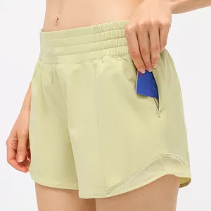 Pantaloncini con logo personalizzato set da yoga estivo, pantaloncini da corsa in mesh giallo Neo per donna