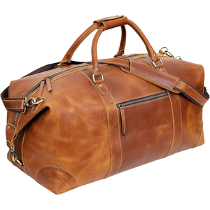 Mejora tu equipaje con una bolsa de viaje 100% de cuero genuino, con una construcción duradera y un interior espacioso y organizado. - Product Image 5