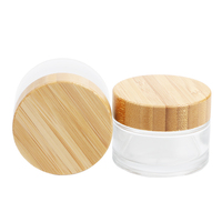 Vente en gros biodégradable Emballage cosmétique cylindrique de 30g 50g Pot de crème pour soin de la peau Bocaux en verre dépoli avec couvercles en bambou