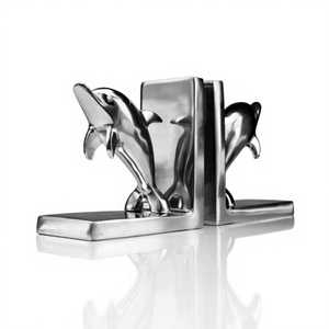 Sujetalibros de Metal de diseñador hecho a mano decorativo pulido de plata Sujetalibros de Metal forma de delfín Sujetalibros de lujo de diseñador hecho a mano - Product Image 1
