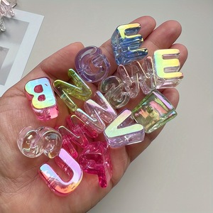 Novedad en Cuentas de Acrílico Transparente con Baño UV Iridiscente, Agujero Grande de 6mm, Letras del Alfabeto de 20mm, Gruesas de Plástico para Cadena de Móvil - Product Image 1