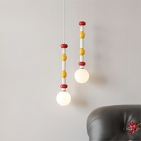 Design moderne du milieu du siècle chambre tête de lit pendentif coloré chambre d'enfants modèle Simple Macaron couleur lustre lumière