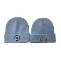 Casquette en tricot acrylique de luxe personnalisée pour l'hiver, avec logo brodé en PVC et silicone, étiquette privée, logo personnalisé