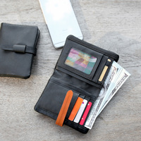Dompet Pendek Lipat Vertikal Kulit Sapi Impor Dengan Penutup Tali Kulit