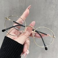 Lunettes anti-lumière bleue unisexes vintage rondes en métal avec design léger et verres transparents en PC pour écrans d'ordinateur
