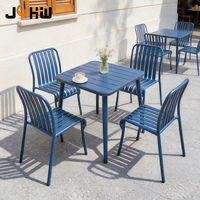Ensemble de table et chaises de salle à manger d'extérieur en aluminium empilable au design moderne, résistant à la rouille, pour café et restaurant - Vente chaude