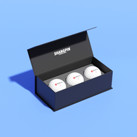 Vente en gros de boîte-cadeau de golf magnétique en papier noir de luxe boîte d'emballage de balle de golf de stratification brillante à couvercle rabattable avec insert en mousse