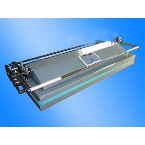 Máquina de montaje de pinturas chinas Huaxia de operación manual para el montaje de obras de arte - Product Image 1