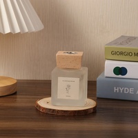 Modische Haushalts gefrostete weiße 50ml quadratische Glasflasche mit Deckel