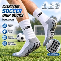 Chaussettes de football antidérapantes respirantes personnalisées avec logo OEM en gros pour hommes, idéales pour l'entraînement et les équipes sportives