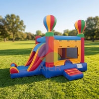 Promotion : Château gonflable commercial extérieur arc-en-ciel avec toboggan, idéal pour la location