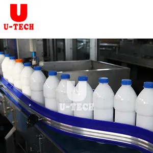 Machine automatique de remplissage et de capsulage de lait aseptique froid de bouteille d'ANIMAL FAMILIER de baril de 500ml 1L 1gallon Machine de remplissage d'embouteillage de lait frais
