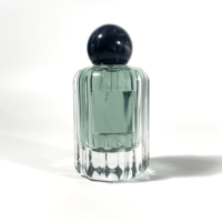 Bouteille d'atomiseur d'huile essentielle de cylindre de forme plate transparente transparente de 100ml avec le chapeau sphérique pour l'emballage d'épices de jet de brouillard