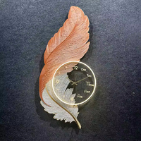 Horloge d'art murale en plumes personnalisée de haute qualité Éclairage LED Décoration murale en céramique de chambre à coucher