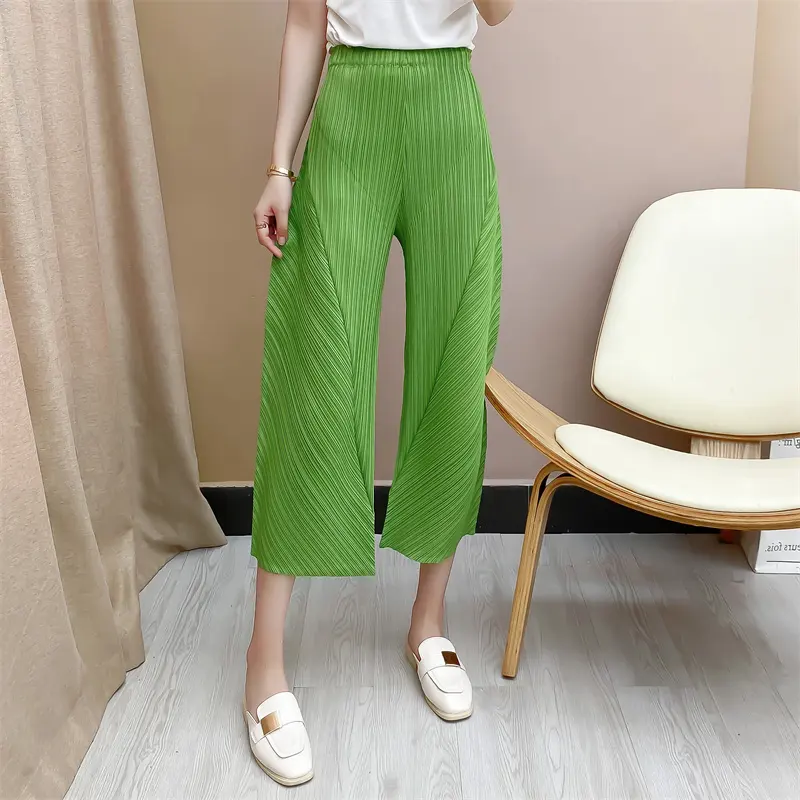 Tianbao Miyake 2022 새로운 재고 공장 도매 레저 패션 바느질 느슨한 대형 여성 바지