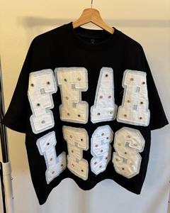 Camiseta Oversize de Algodón con Estampado Digital The Hustler, Unisex, Estilo Urbano, Cuello Redondo, Manga Regular, Ajuste Jersey, Transpirable para Invierno - Product Image 1