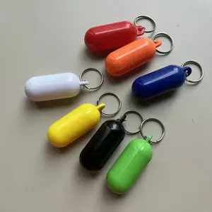 מפעל סיטונאי מותאם אישית לוגו קפסולת צורת Keychain לצוף פלסטיק ABS צף מפתח שרשרות