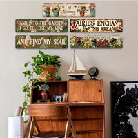 Décoration murale de jardin : Longue plaque métallique avec motifs floraux, abeilles, papillons, fées et plantes, et citation de jardin