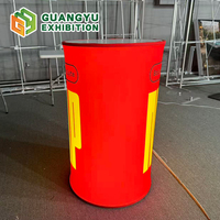 Comptoir d'exposition portable en gros, table pliable en aluminium avec tissu et éclairage LED pour salons professionnels, tables promotionnelles de forme ronde