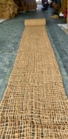 100% fibres de noix de coco naturelles Coir Net géotextiles tissés à la main par les deux mains efficaces pour l'érosion des sols et le contrôle du glissement des terres