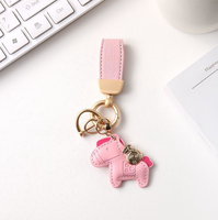 Promotion : Pendentif de sac de luxe en cuir, motif poney, avec pompon, pour femme, ornement animal, porte-clés de voiture, breloque de sac de créateur en forme de cheval, pour filles