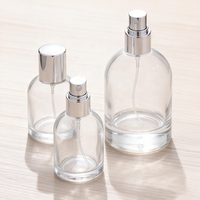 Vente en gros OEM, flacon pulvérisateur en verre transparent personnalisé avec pompe pulvérisatrice pour huile essentielle d'aromathérapie, parfum, 30 ml, 50 ml, 100 ml