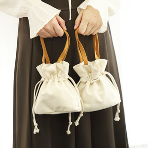 กระเป๋าผ้าแคนวาสลายเรียบง่าย สไตล์แฟชั่นสดใส พร้อมเชือกผูก สำหรับใส่โทรศัพท์มือถือ เหรียญ และของช้อปปิ้ง - Product Image 3