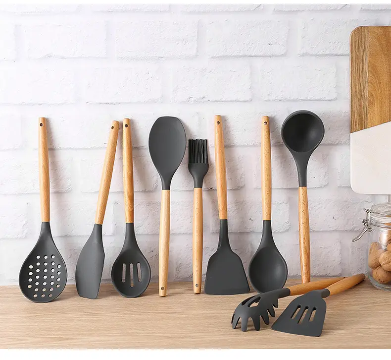 Wholesale 12 pieces Non-Stick kitchen utensil cookware set with wooden handle plastic stand silicone cooking utensils